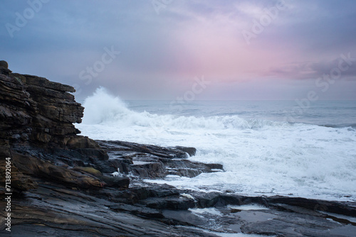waves crashing on rocks