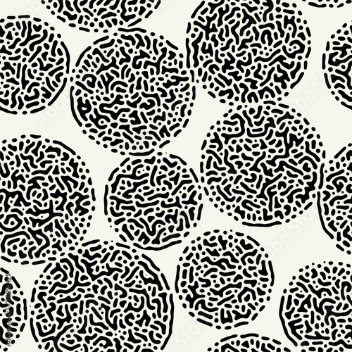Vector seamless pattern. Random disposed organic shapes. Stylish structure with circles. Hand drawn abstract background. Can be used as swatch in Illustrator. Monochrome spotty print.