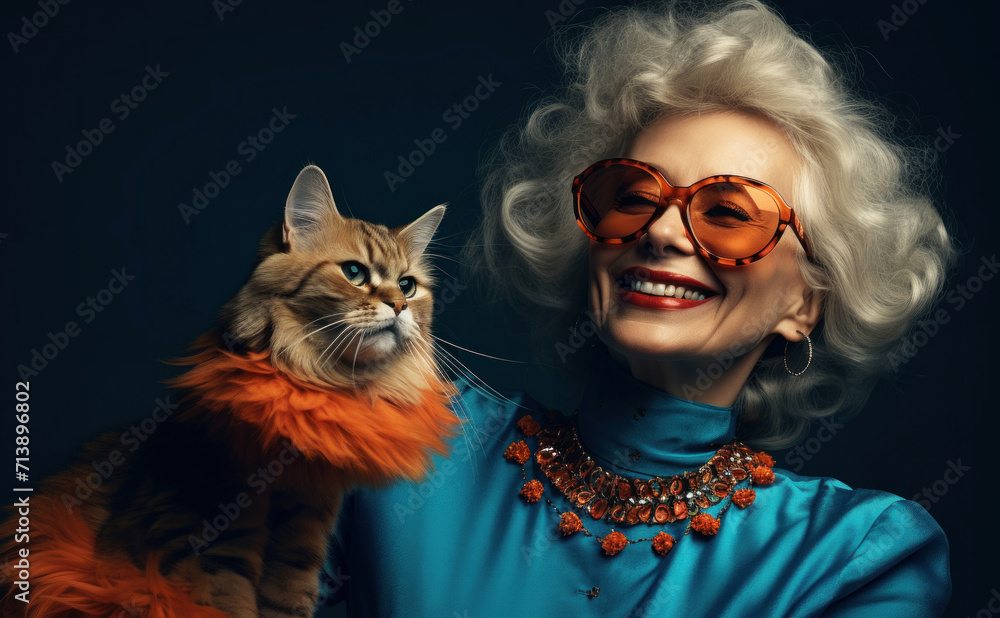Happy senior lady with fashion  cat on darck background. Woman and pet.