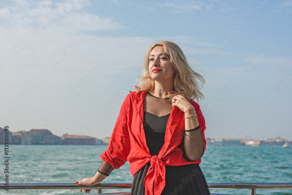 Vacation in Venice - Italy. Concept of tourism and holidays. Woman in city scene Vacation in Venice - Italy. Concept of tourism and holidays. Woman in city scene