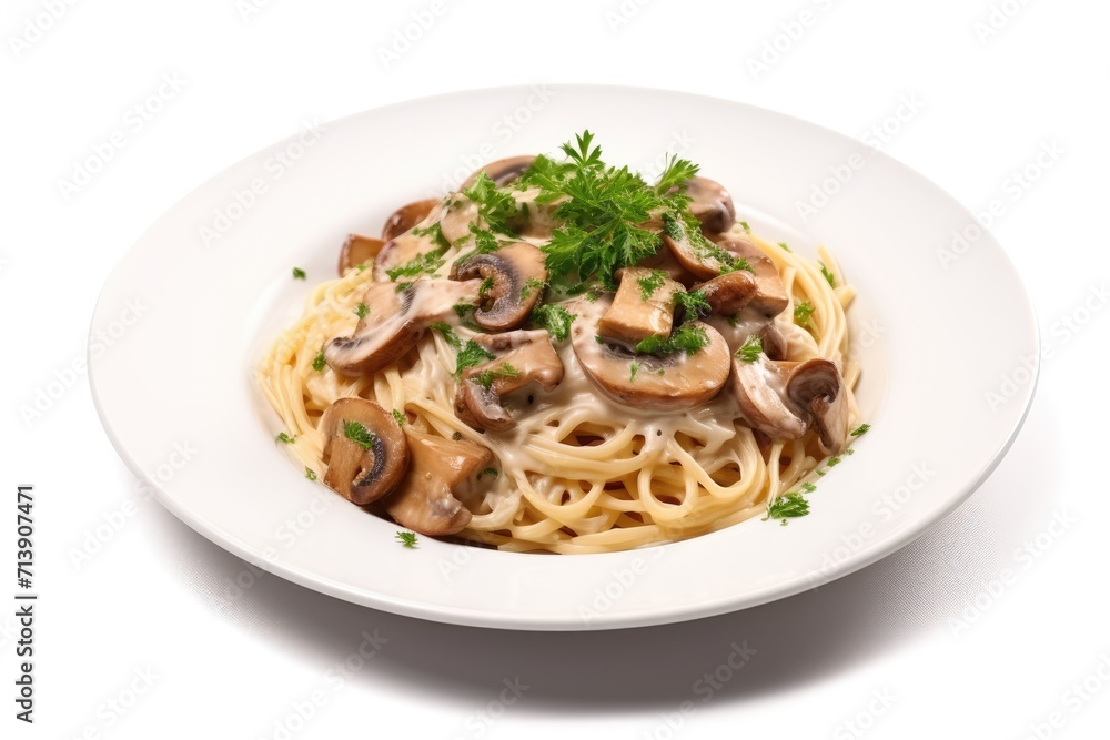 Spaghetti pasta with mushrooms and creamy sauce on white background garnished with parsley