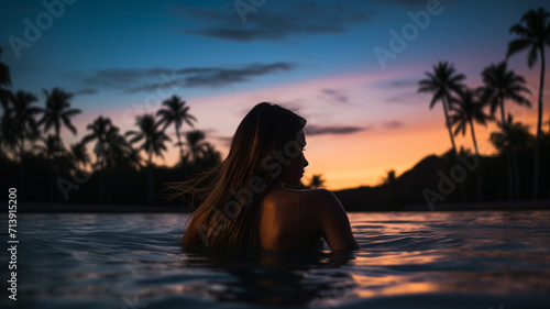 Dusk Serenity Dip - Woman Delighting in a Tranquil Swim in Nature's Lagoon, the Ultimate Natural Swimming Pool