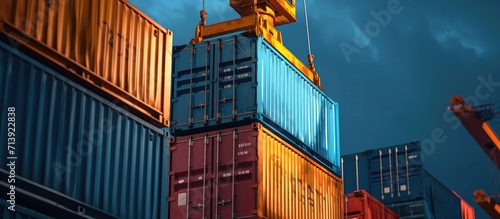 Blue building containers cargo containers residential containers at a loading crane. Creative Banner. Copyspace image