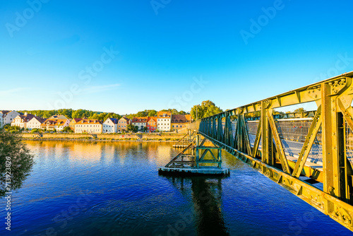 View of the Donau in the city of Regensburg and the Eiserner Steg pedestrian bridge.
 photo