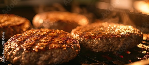 Four hamburger patties with dimple prepared for frying in a household kitchen. Creative Banner. Copyspace image