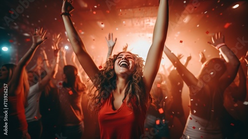 Group of young women dancing in a party, real photo, stock photography with a high-contrast color full hectic photo