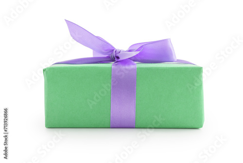 Green paper present box with violet ribbon bow isolated on white background