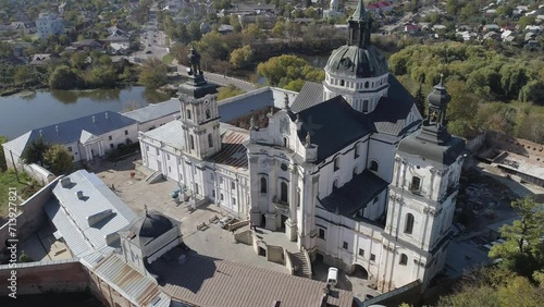 Aerial drone autumn footage of Monastery of the Bare Carmelites in Berdychiv, historic city in Zhytomyr Oblast, northern Ukraine. photo