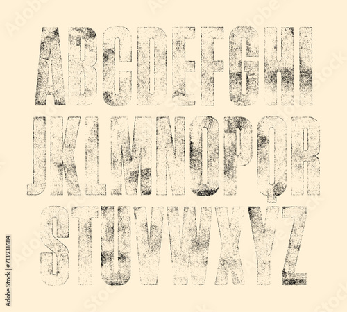 Faded, worn ink texture font (Lighter version). Highly detailed hand textured characters with a faded, rough, rolled ink print texture.