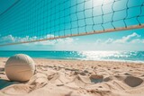 white volleyball rests on the textured golden sand with visible footprints around it