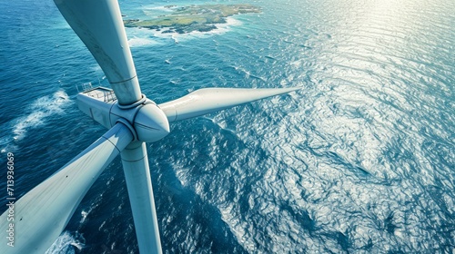 A majestic windmill stands tall, its propeller spinning in harmony with the sea breeze, as a plane glides overhead and sailboats dot the ocean in the background