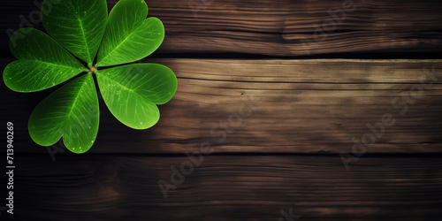 Felt clover leaves on old wooden background. Clovers on grunge old aged wooden , shamrock leaves,