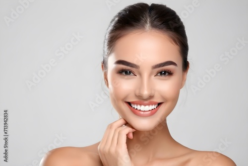 Beautiful Young Woman Showcasing a Beaming Smile with Sparkling White Teeth.