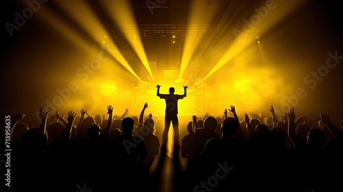 The crowded church worship rally with distance silhouette figure of the televangelist on stage light