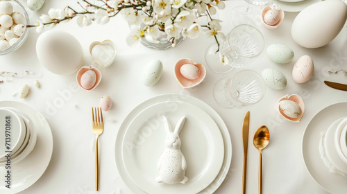 Aesthetically decorated table with easter bunnies, eggs, gold cutlery. Festive Easter concept. Top view. Generative AI