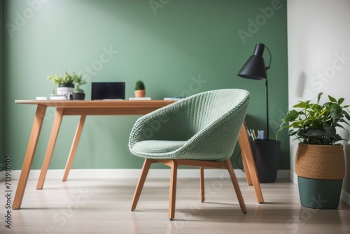 Interior home design of modern workplace with table and chairs with green walls and plant decoration