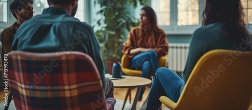 Therapeutic group sessions provide a supportive environment for men and women facing mental health issues, addiction, or depression, where they can build trust, share experiences, and communicate with photo