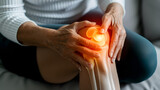 Senior woman with knee pain at home with highlighted knee, health concept