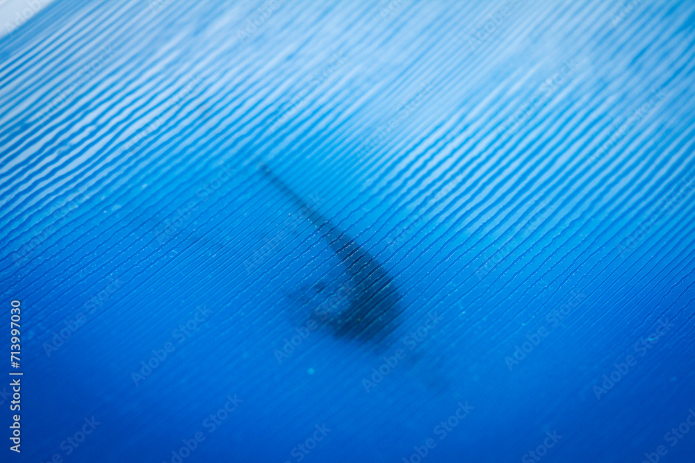 Obraz premium Macro shot of blue marbled vinyl record