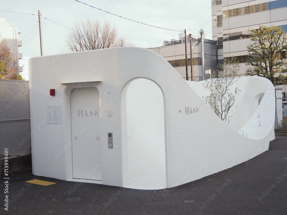 TOKYO, JAPAN - January 19, 2024: A public toilet on a street in Tokyo's Shinjuku Ward. It's part ...
