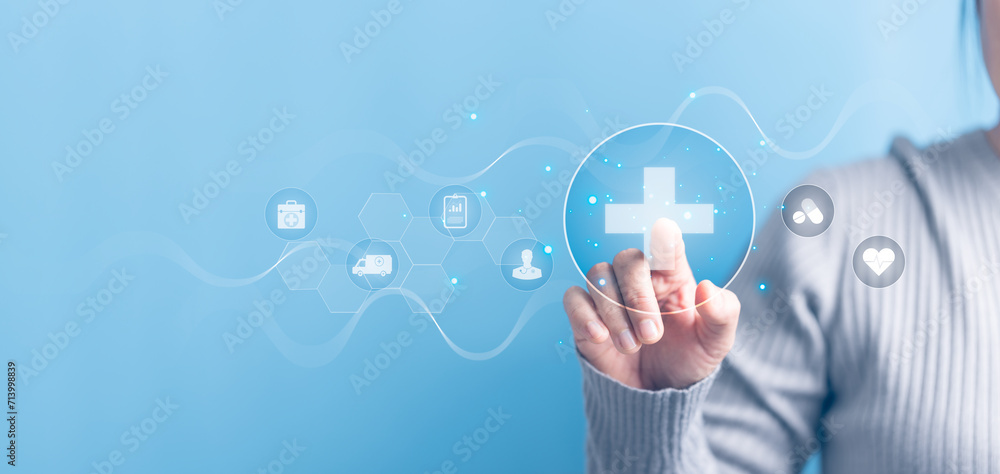 Woman hand touching plus with healthcare medical icon on blue sky background. Health insurance health concept. Access to welfare health and copy space, benefit pharmacy, plan community treatment. - obrazy, fototapety, plakaty 