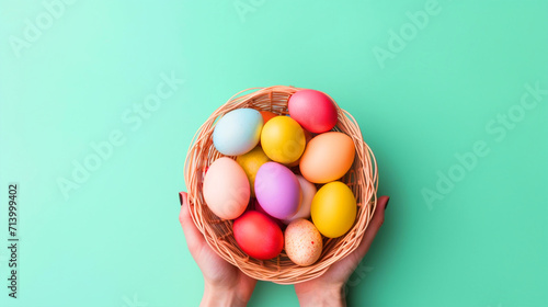 Hands holding a bucket full of colorful easter eggs - ai generative