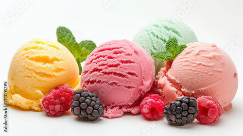 Scoops of colorful ice cream with fresh berries.
