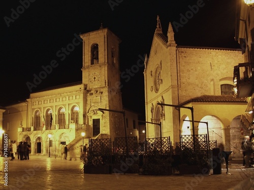 La piazza San Benedetto a Norcia di notte. photo