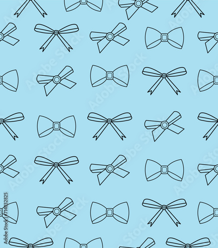 Pattern of bows on a blue background.