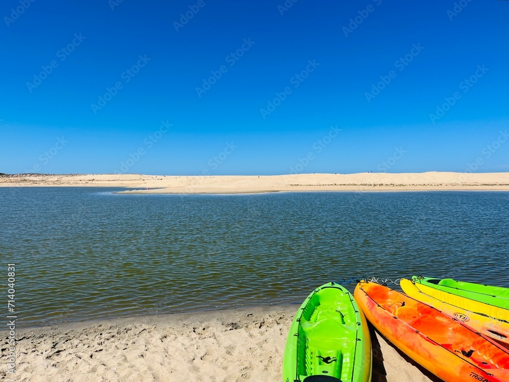 Colorful kayaks at the lake Colorful kayaks at the lake
