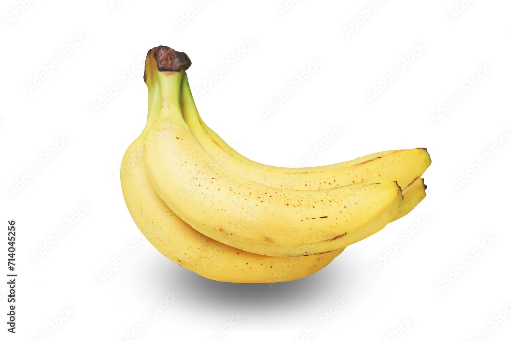 Ripe banana isolated on white. Bunch of bananas. Yellow fruit cutout. Natural brown spots. Ready to eat everyday snack.