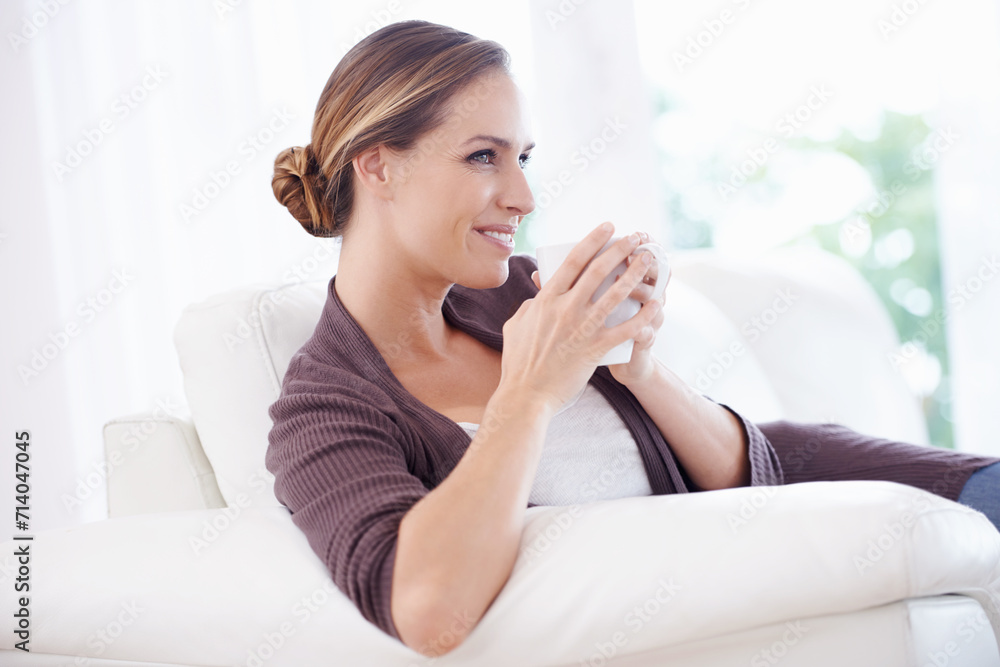Thinking, coffee and happy woman relax on a sofa with memory, moment or reflection in her home. Tea, break and female person in a living room with comfort, beverage or day off, me time or self care Thinking, coffee and happy woman relax on a sofa with memory, moment or reflection in her home. Tea, break and female person in a living room with comfort, beverage or day off, me time or self care