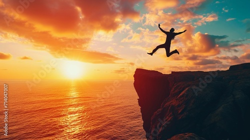 Welcome Merry Christmas and 2025 New Year concept, Silhouette of a businessman jumping on a cliff in 2025 over a sea cliff at a beautiful sunset. business plan and success for 2024. goal, plan, action photo