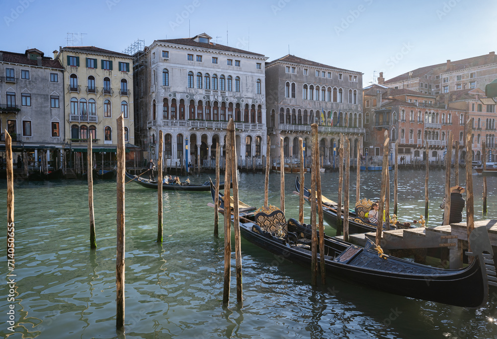 Venice panorama with historical buildings in background and gondolas in front, Italy, Europe