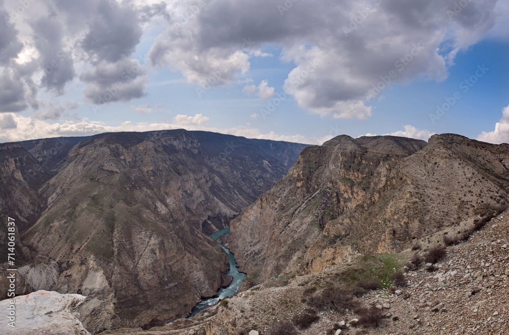 Russia. North-eastern Caucasus. The Republic of Dagestan. A dizzying panoramic view of mountain serpentines on the slopes of the Sulak canyon from the steep cliffs of the village of Dubki.