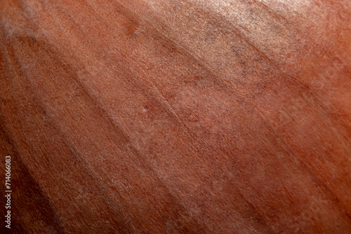Close up macro of layered onion peel with fine detail. Brown yellow orange organic natural texture
