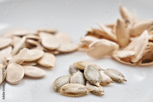 Cleaned and whole pumpkin seeds. Selective focus. Close-up