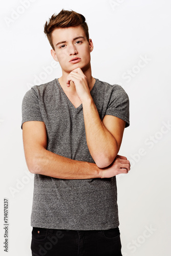 Fashion, portrait and man thinking in studio with planning, expression or gesture on white background. Face, attitude or male model with why, questions or brainstorming, emoji or problem solving