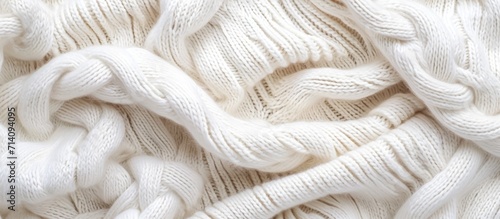 White wool knit fabric with cable pattern as backdrop photo