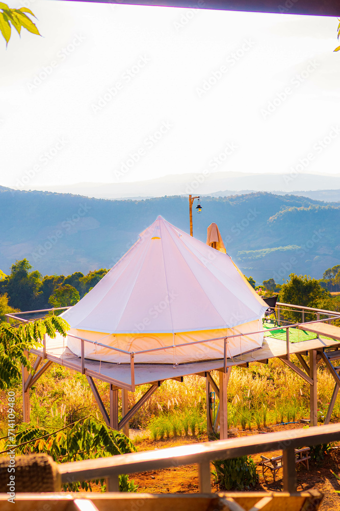 View of the mountains from above the white tent. View of the mountains from above the white tent.