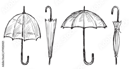 Sketches of closed and opened umbrellas, hand drawn vector illustration isolated on white photo