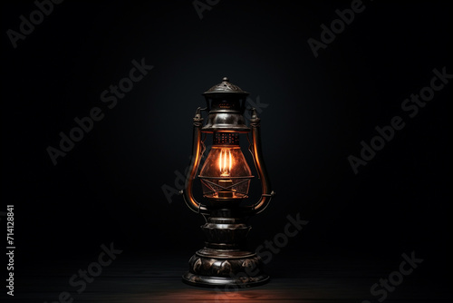 Old lamp on black background