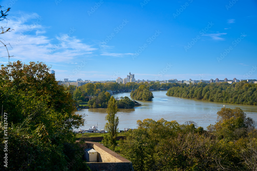 Sunny autumn landscape along the Danube with trees in Belgrade, Serbia