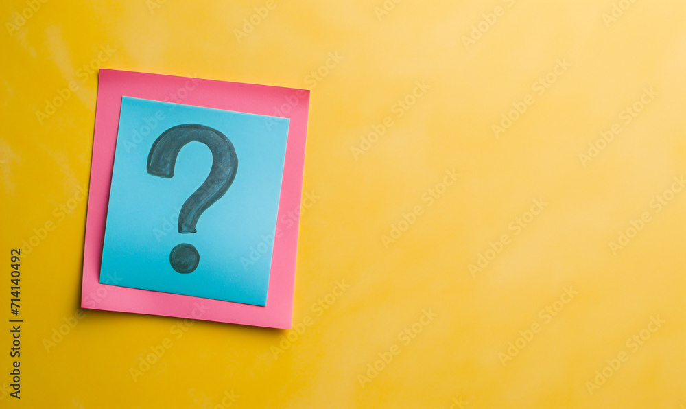 Question mark on a blue sticker. Brainstorm. Background for website and social networks with copy space. Logic and reasoning concept. Question mark on a blue sticker. Brainstorm. Background for website and social networks with copy space. Logic and reasoning concept.