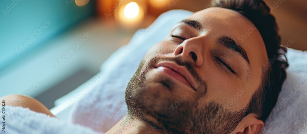 Pampering experience with skincare and relaxation for a satisfied man at a luxury salon, having a couple's beauty treatment and facial using skincare products. Pampering experience with skincare and relaxation for a satisfied man at a luxury salon, having a couple's beauty treatment and facial using skincare products.
