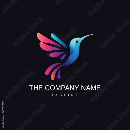 A colorful humming bird logo on a dark background