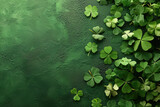 Green background with shamrocks and a four-leaf clover for St. Patrick's Day.