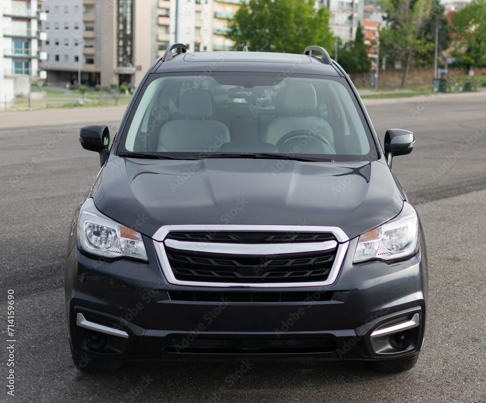 Grey SUV auto, power luxury model. Shiny polished stationary vehicle. Grey SUV auto, power luxury model. Shiny polished stationary vehicle.