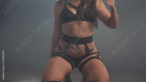 Woman in black lingerie moves seductively