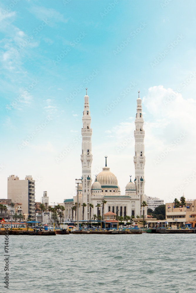 Port Fouad Grand Mosque. suez canal with a grand mosque and blue cloudy sky. Port-said , Egypt 